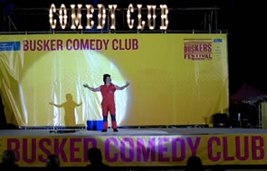 Ernest on the Busker Comedy Club stage at the World Buskers Festival
